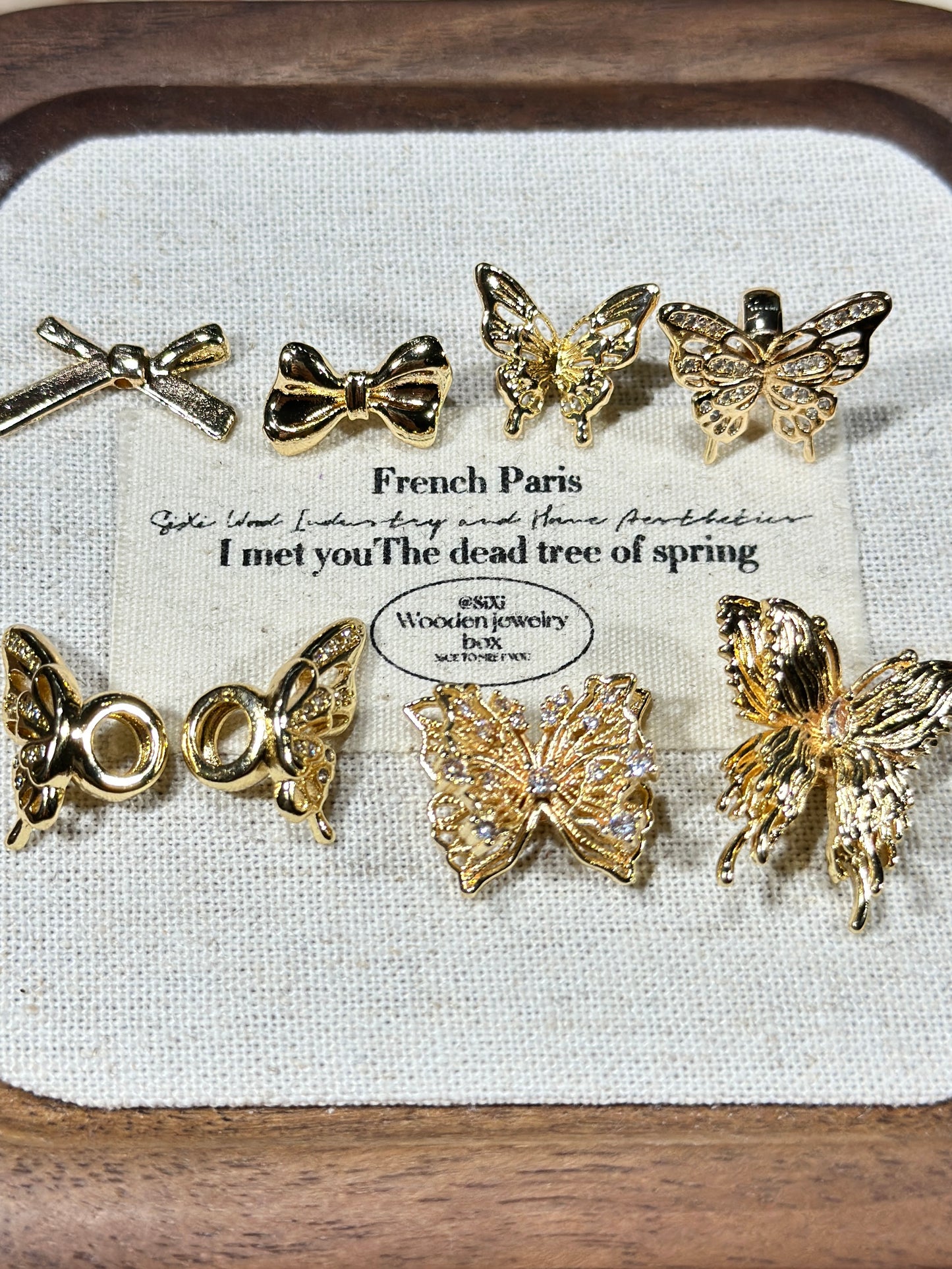 Light gold butterfly spacer