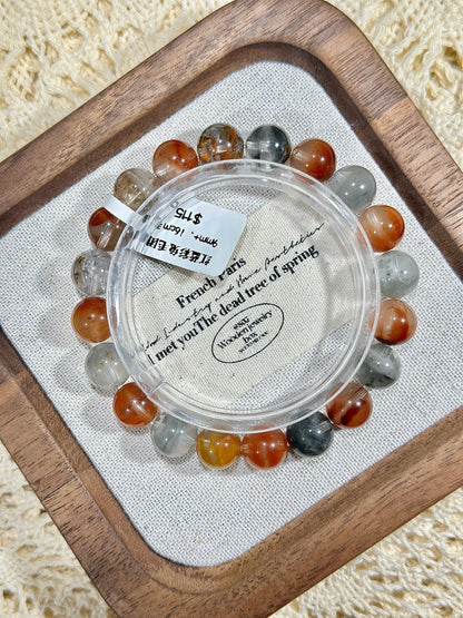 Red and blue rabbit fur ball