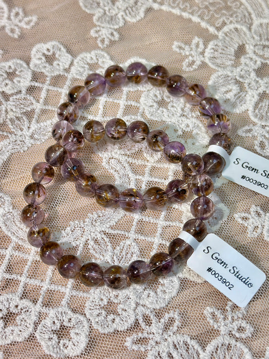 透体羽毛紫钛晶