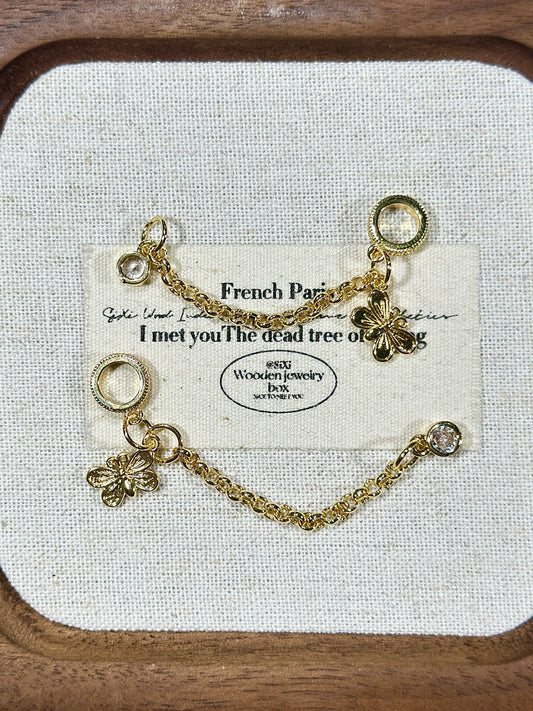 Bright gold butterfly safety chain