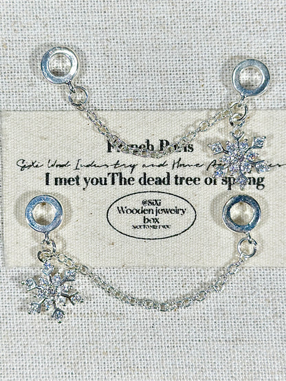 Bright silver snowflake trickle safety chain