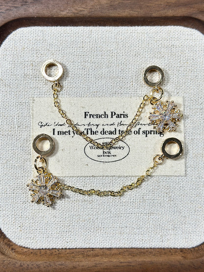 Light gold snowflake trickle safety chain