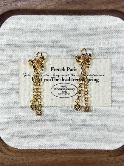 Light gold bow tassel drip