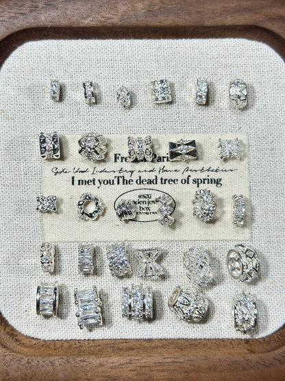 Bright silver ring spacer