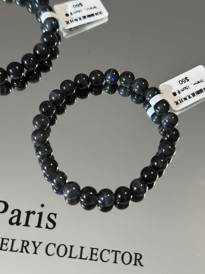 Black cat's eye blue light gray moonlight