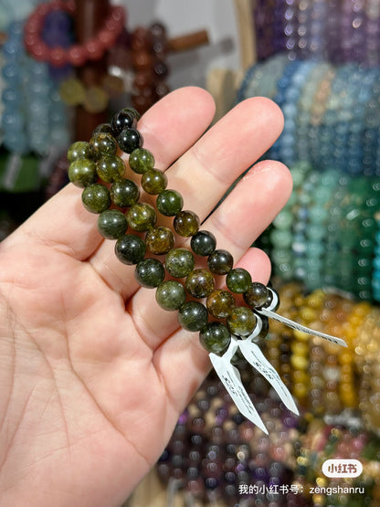 Full green tourmaline crystal