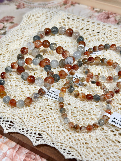 Red and blue rabbit fur ball