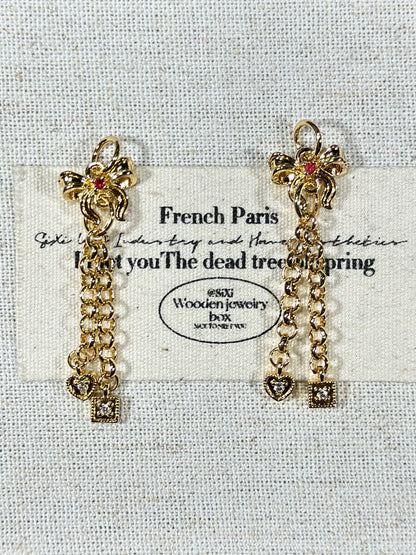 Light gold bow tassel drip