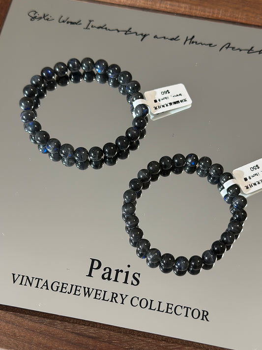 Black cat's eye blue light gray moonlight