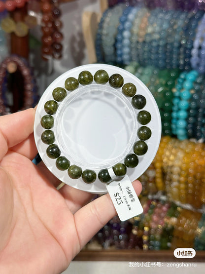 Full green tourmaline crystal