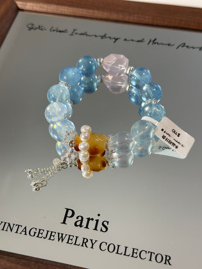 Design | Aquamarine, Rose Quartz and Beeswax Bear