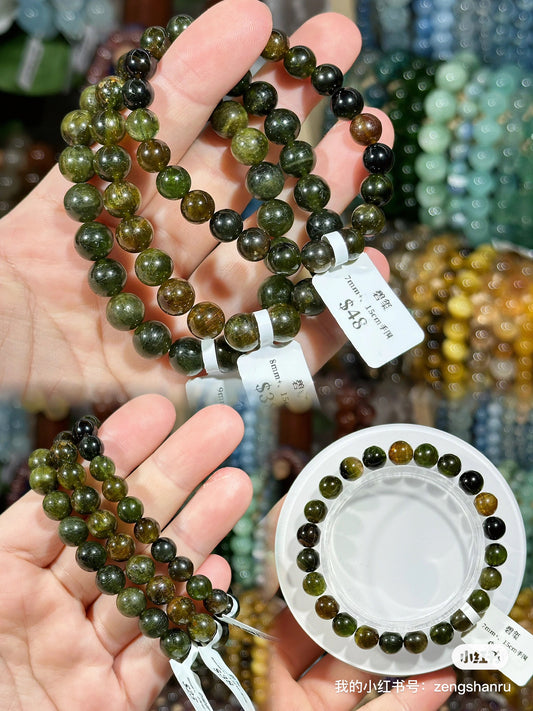 Full green tourmaline crystal