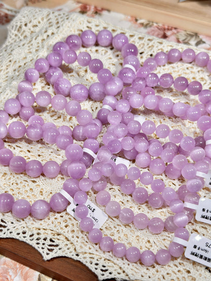 Waxy cat's eye purple spodumene