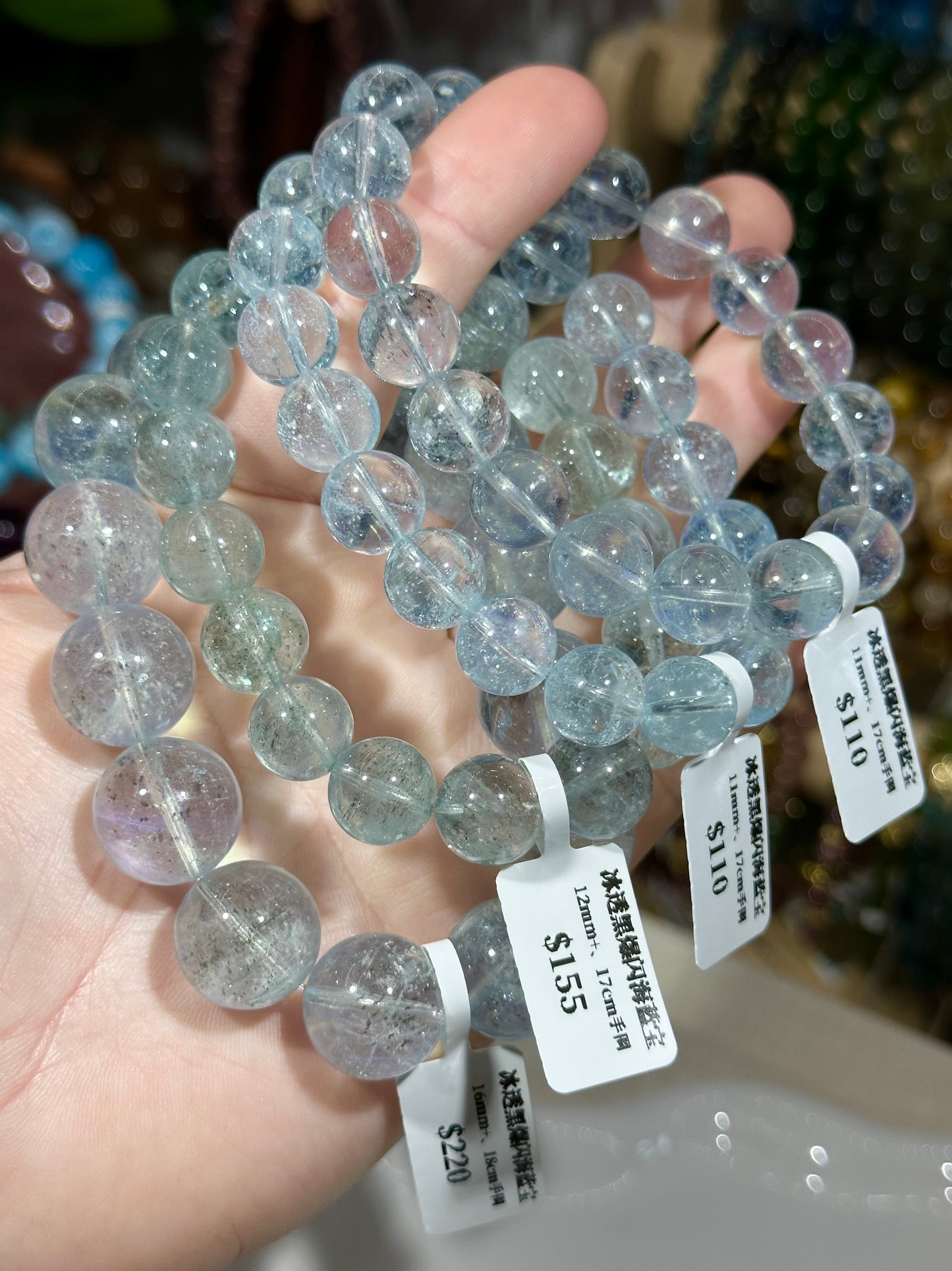 Ice-clear black glittering aquamarine crystal