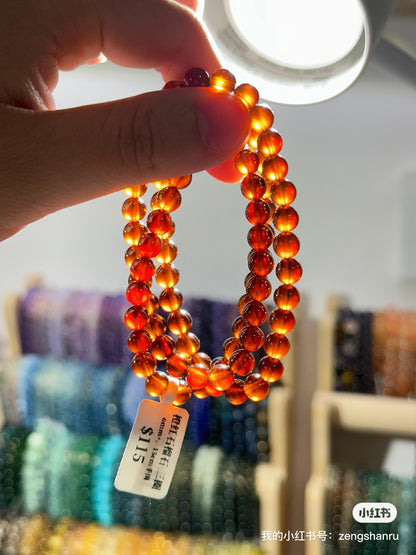 Orange garnet multiple rings