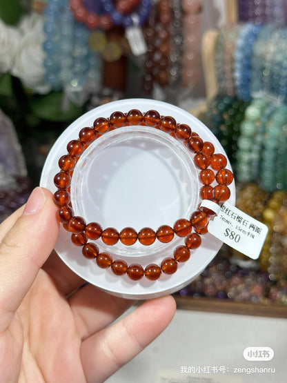 Orange garnet multiple rings
