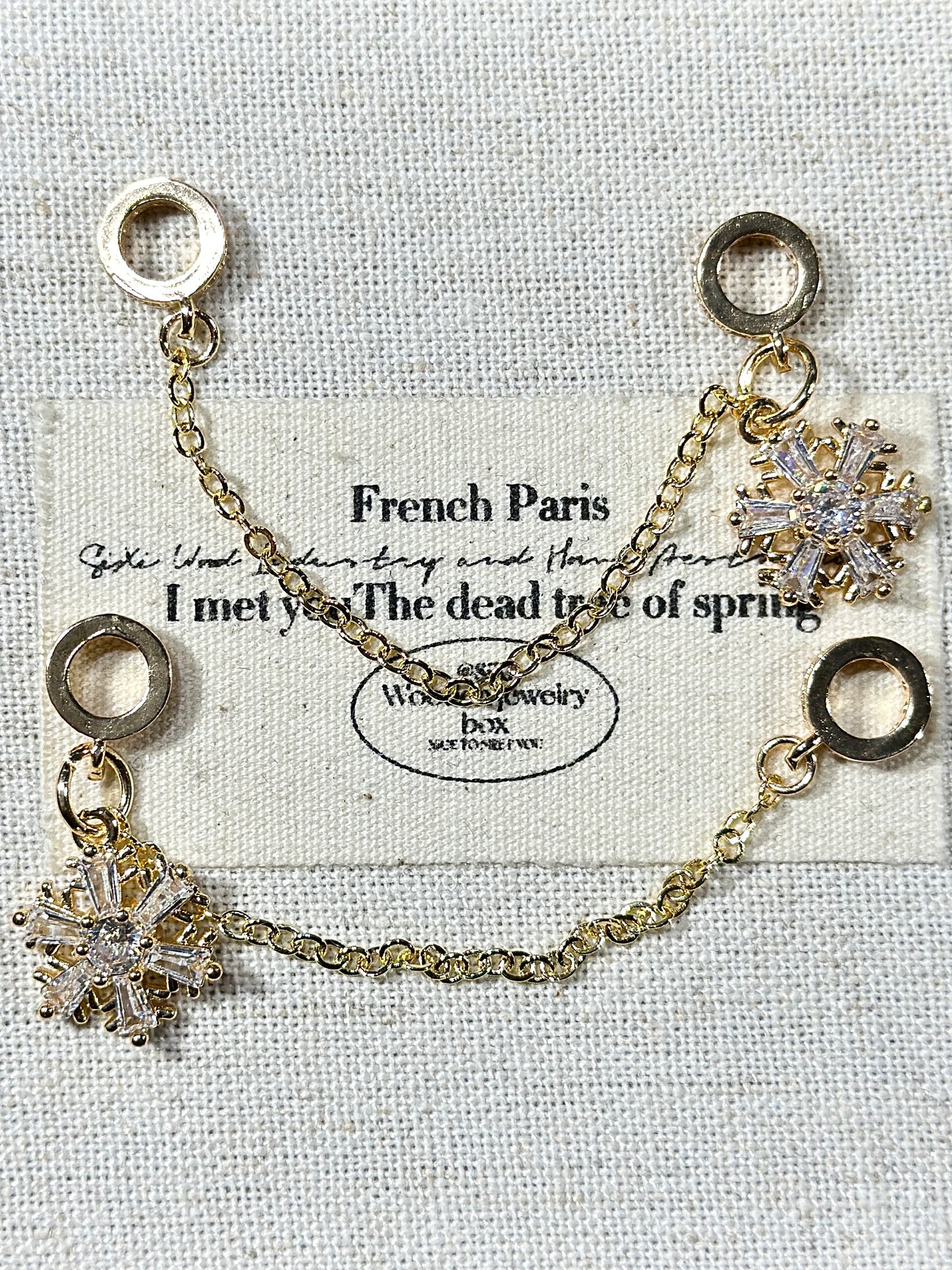 Light gold snowflake trickle safety chain