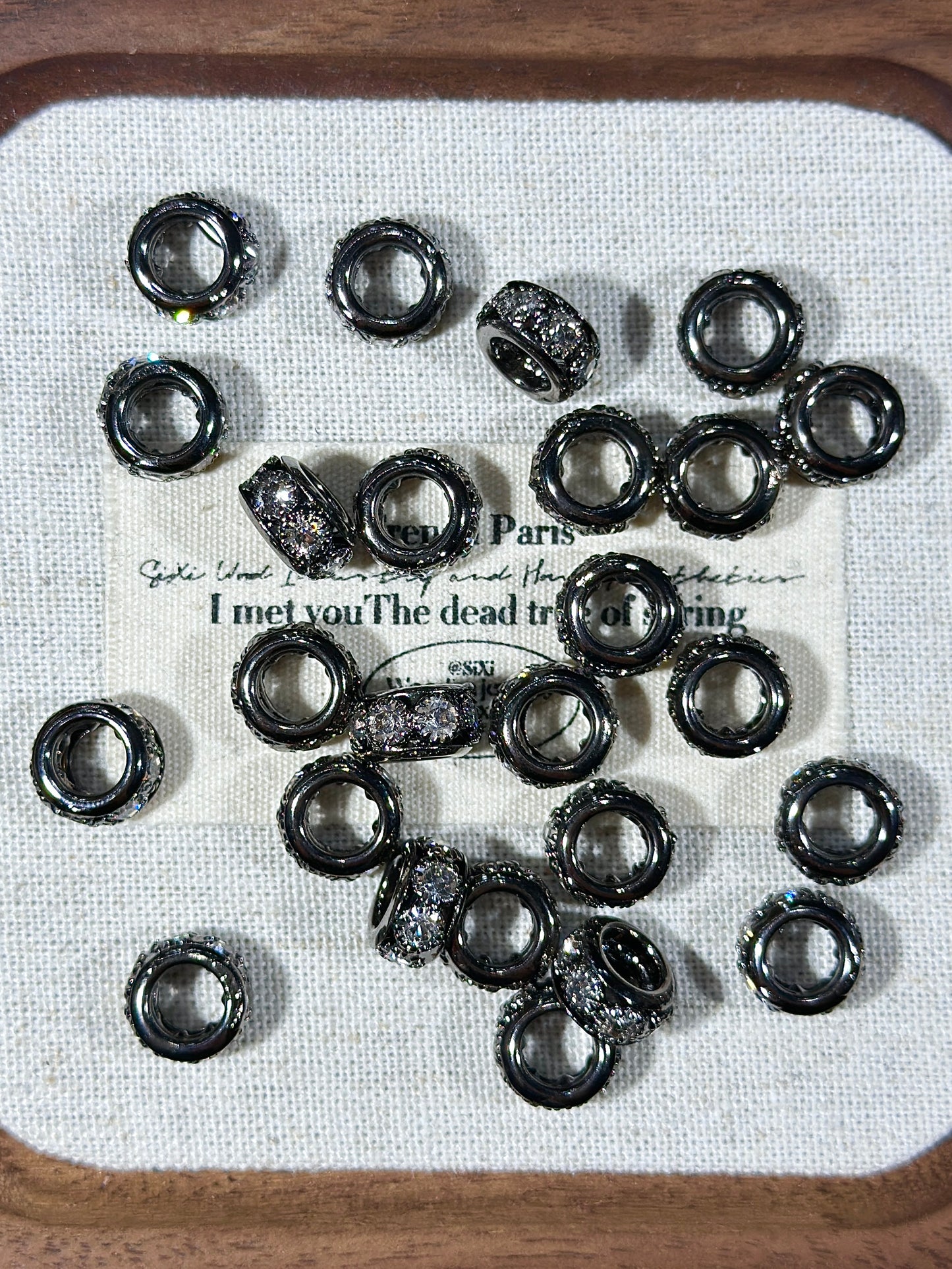 Gun black spacer bead ring