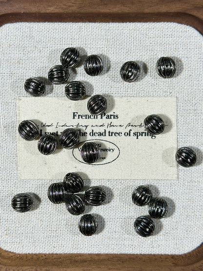 Gun black spacer bead ring