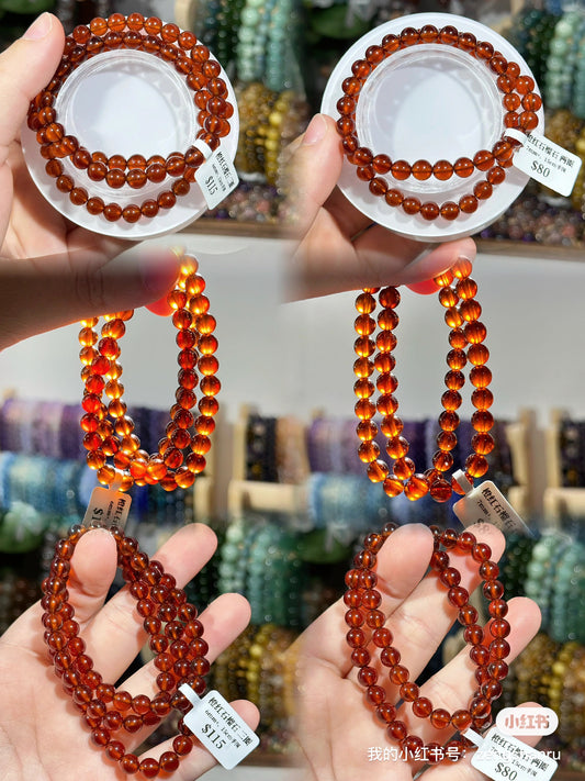 Orange garnet multiple rings