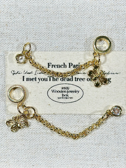 Bright gold butterfly safety chain