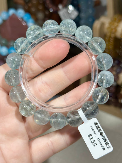 Ice-clear black glittering aquamarine crystal