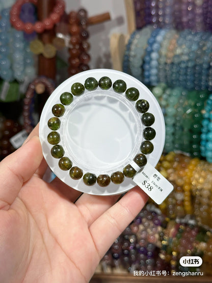 Full green tourmaline crystal