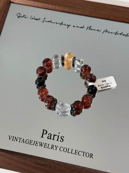 Design | Red Gum Flower, White Crystal, and Gold Obsidian