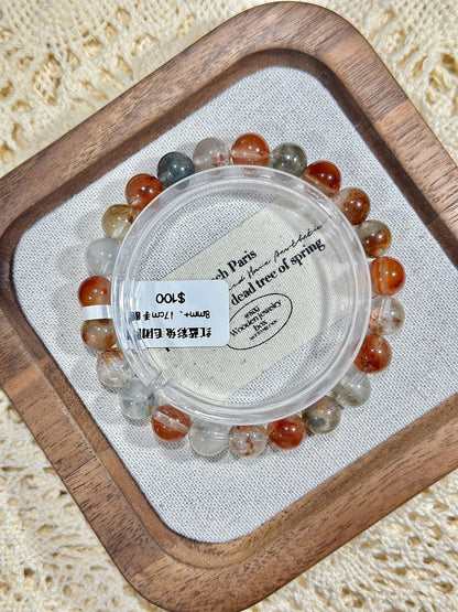 Red and blue rabbit fur ball