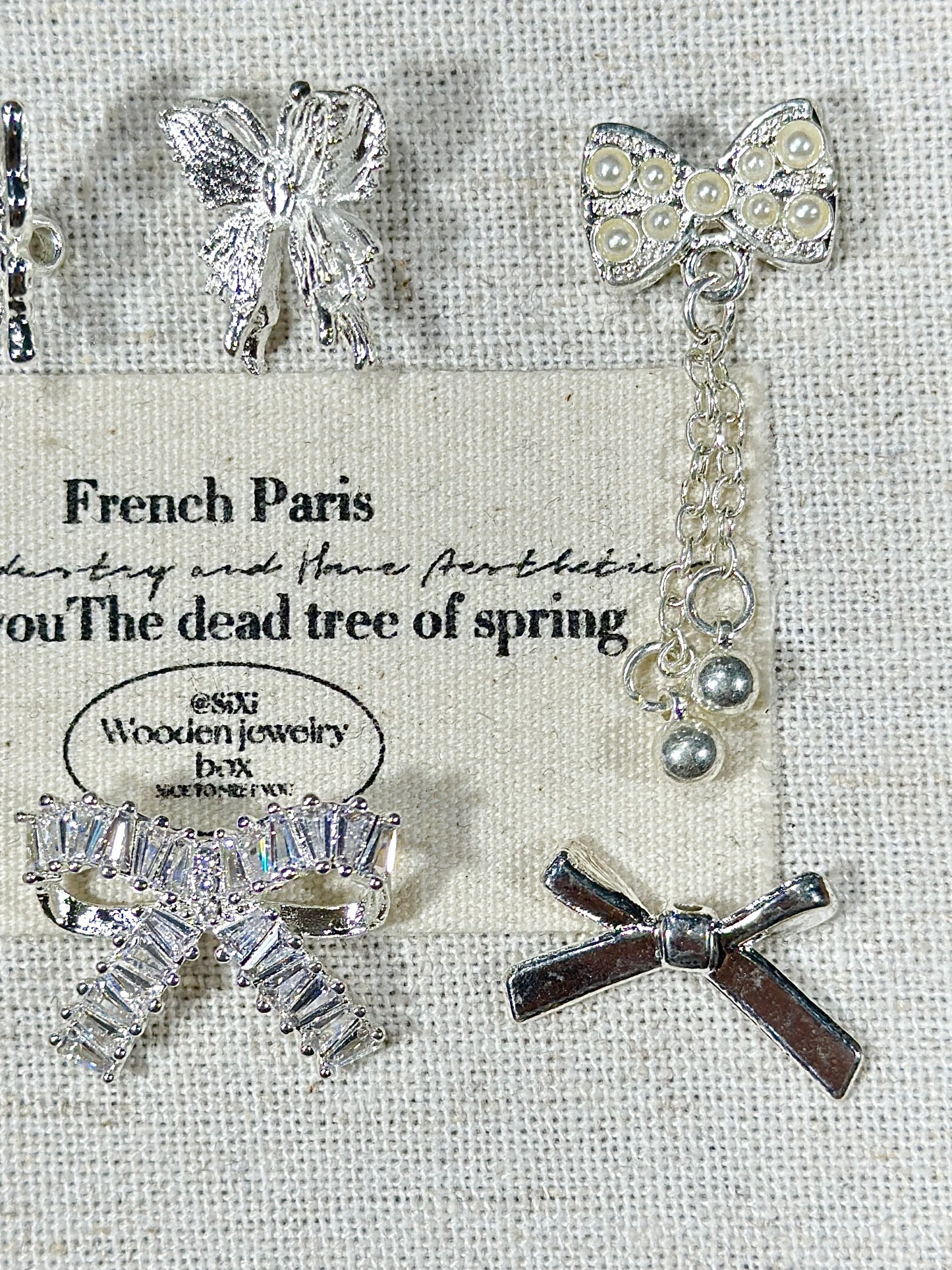 Bright silver butterfly spacer