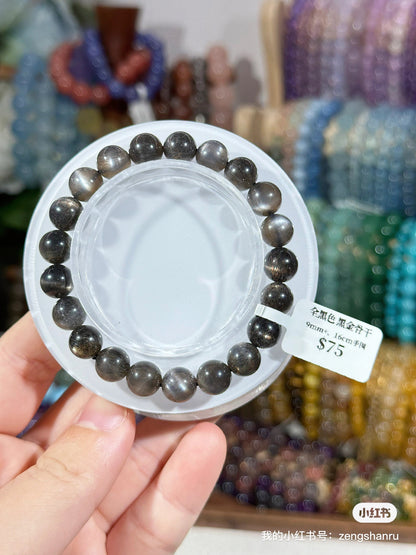 All black black gold backbone crystal