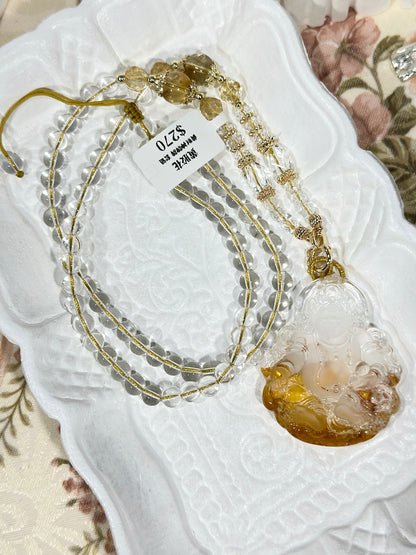 Yellow glue flower carved yellow god of wealth pendant necklace