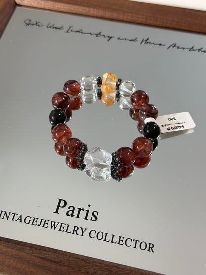 Design | Red Gum Flower, White Crystal, and Gold Obsidian