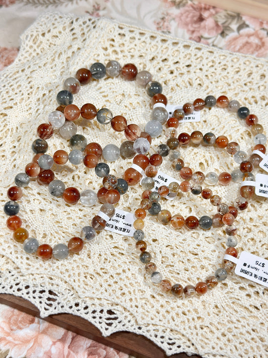 Red and blue rabbit fur ball