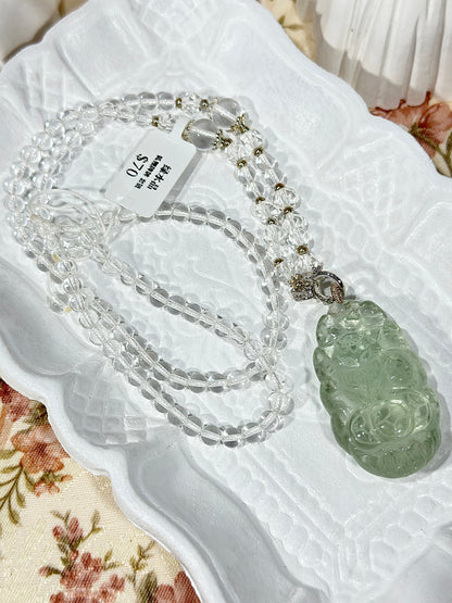 Green crystal engraved fox necklace