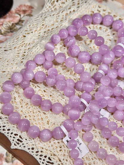 Waxy cat's eye purple spodumene