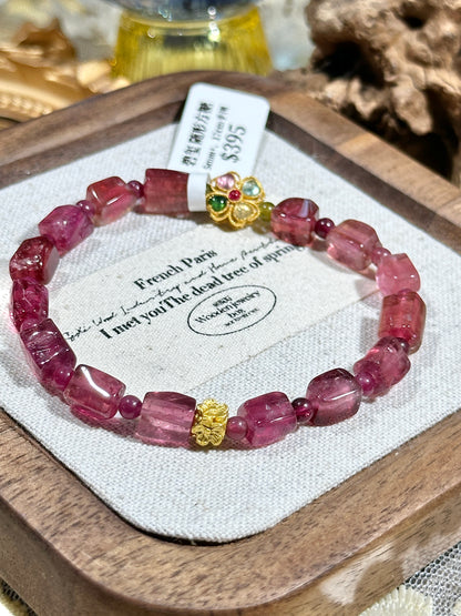 Free-shaped sugar cube full of red tourmaline