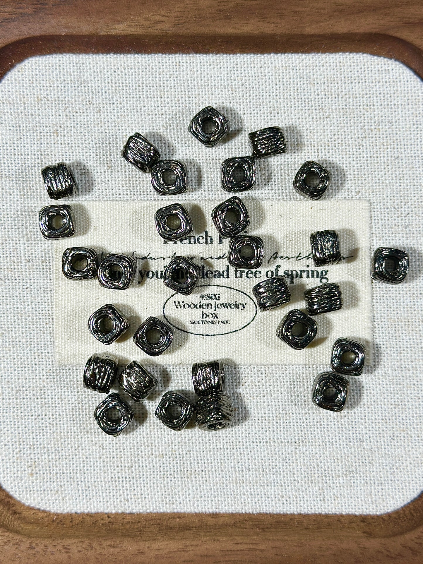 Gun black spacer bead ring