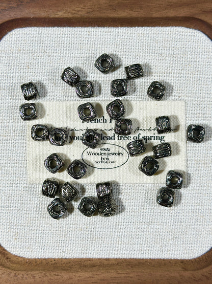 Gun black spacer bead ring