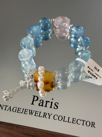 Design | Aquamarine, Rose Quartz and Beeswax Bear