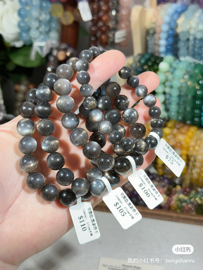 All black black gold backbone crystal