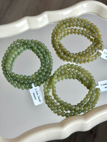 Celadon-yellow Hetian jade multi-strand bracelet