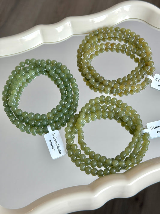 Celadon-yellow Hetian jade multi-strand bracelet